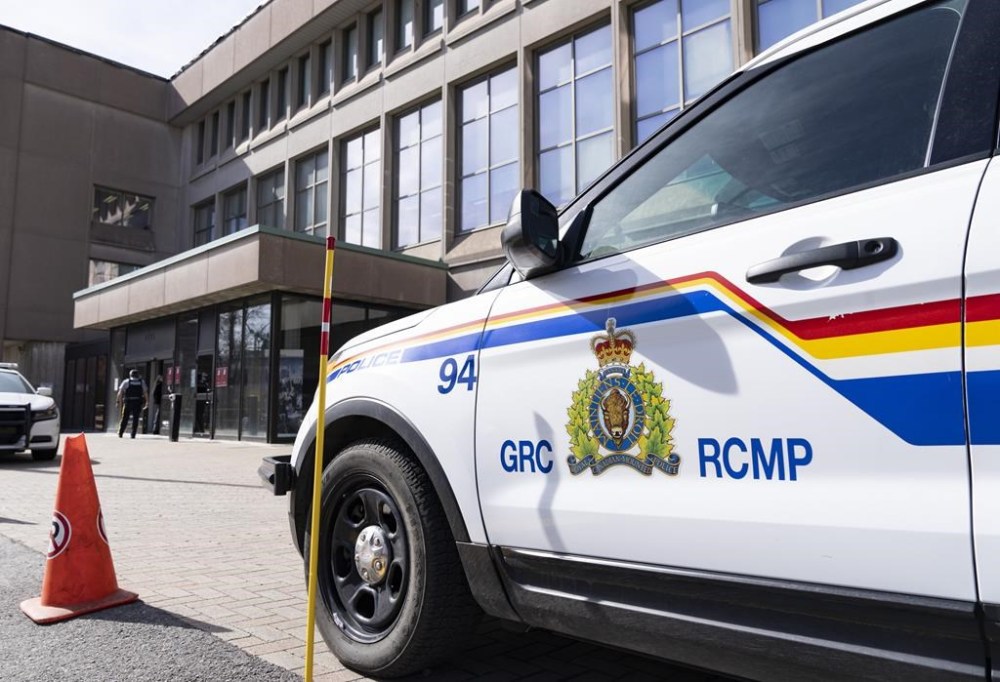 An RCMP logo in shown on a vehicle in Montreal, Thursday, March 7, 2024. A 19-year-old and a 17-year-old are dead after police say a truck with seven teens crashed in eastern Alberta. RCMP say officers responded to the single-vehicle crash early Sunday on a township road near Consort, approximately 260 km northeast of Calgary. THE CANADIAN PRESS/Christinne Muschi
