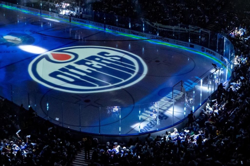 The NHL's Edmonton Oilers announced Tuesday that assistant general manager Brad Holland is leaving the club. Lights and logos cover the arena before the Edmonton Oilers and the Vancouver Canucks play Game 1 of an NHL hockey Stanley Cup second-round playoff series, in Vancouver, B.C., Wednesday, May 8, 2024. THE CANADIAN PRESS/Ethan Cairns