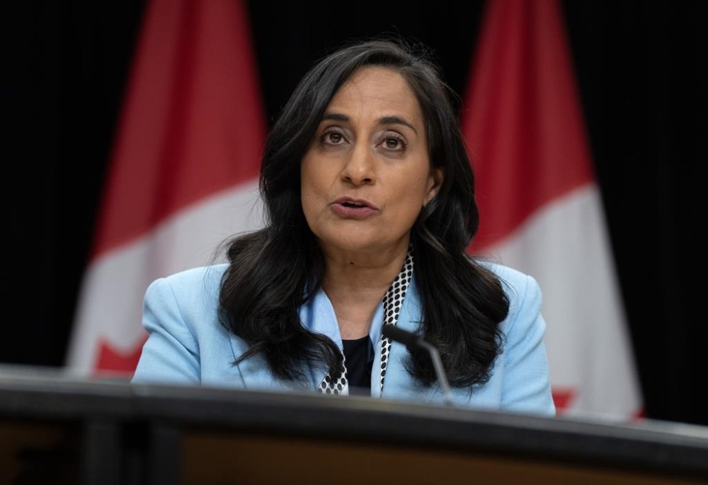 President of the Treasury Board Anita Anand responds to a question during a news conference in Ottawa on June 18, 2024. THE CANADIAN PRESS/Adrian Wyld