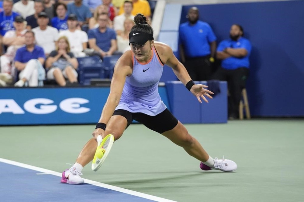 Bianca Andreescu knows a significant part of her job takes place away from the tennis court, in moments she may not even have a racket in her hand. Andreescu returns a shot to Italy's Jasmine Paolini during a first-round match of the U.S. Open tennis championships, in New York, Tuesday, Aug. 27, 2024. THE CANADIAN PRESS/AP-Frank Franklin II