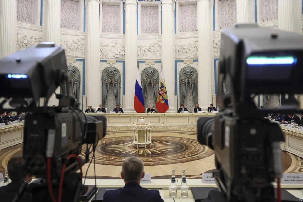 Russian President Vladimir Putin, background center, chairs a meeting of the State Council on export development at the Kremlin, in Moscow, Russia, Wednesday, Sept. 25, 2024. (Sofia Sandurskaya, Sputnik, Kremlin Pool Photo via AP)