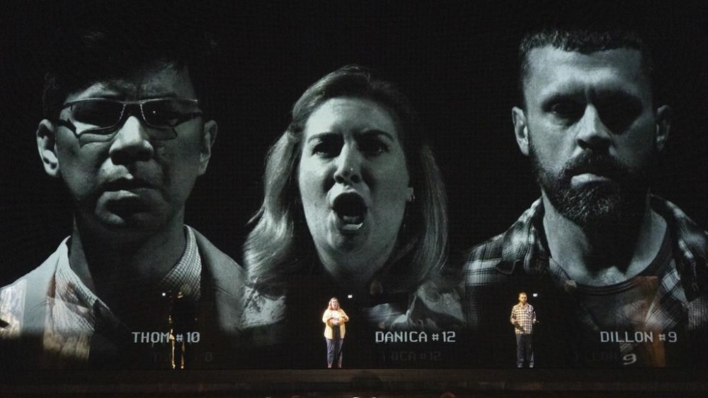 This image released by Opera Philadelphia shows Joseph Lim, from left, Diane Newman and John Moore, during a performance of