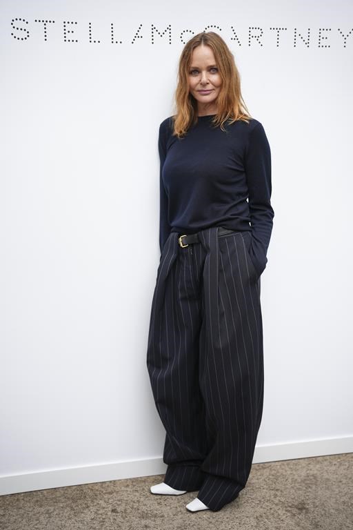Stella McCartney poses for photographs after her Spring/Summer 2025 collection presented Monday, Sept. 30, 2024 in Paris. (Photo by Scott A Garfitt/Invision/AP)