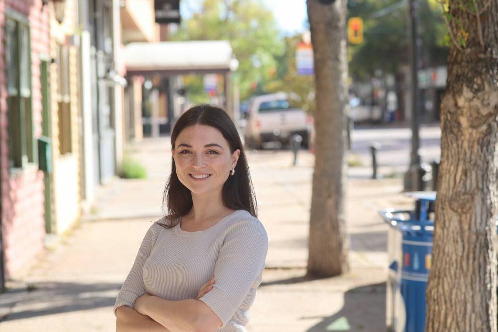 The Brandon Chamber of Commerce’s new general manager, Olivia Boyce, stands in front of the chamber offices on Tuesday morning. (Abiola Odutola/The Brandon Sun)
