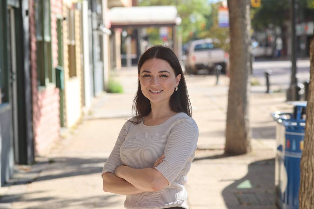 The Brandon Chamber of Commerce’s new general manager, Olivia Boyce, stands in front of the chamber offices on Tuesday morning. (Abiola Odutola/The Brandon Sun)