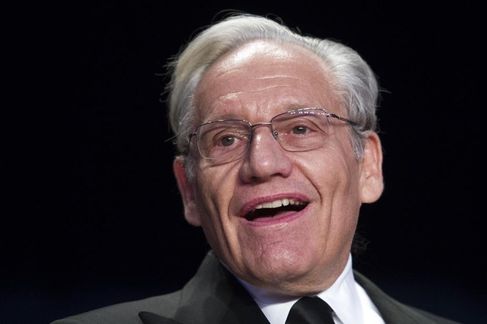 FILE - In this April 29, 2017, file photo journalist Bob Woodward sits at the head table during the White House Correspondents' Dinner in Washington. (AP Photo/Cliff Owen, File)