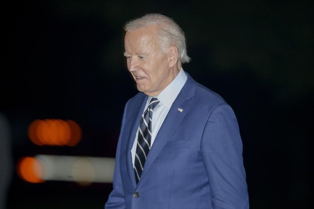 President Joe Biden disembarks Marine One after arriving on the South Lawn of the White House in Washington, Tuesday, Oct. 8, 2024. (AP Photo/Rod Lamkey, Jr.)