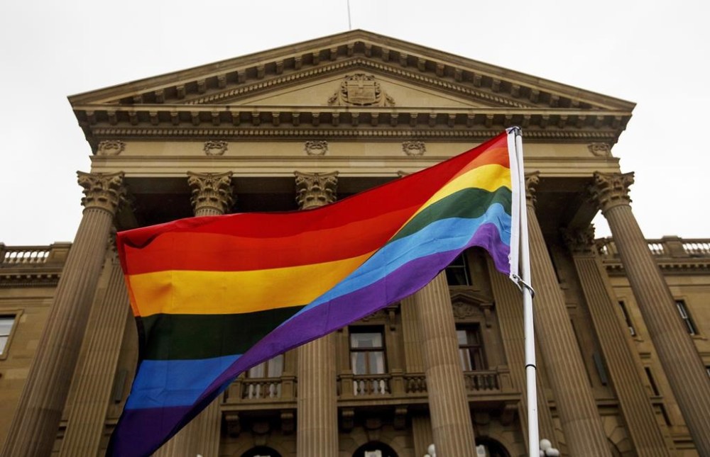 Protesters take part in a Gay Straight Alliance rally at the Alberta Legislature in Edmonton on Wednesday June 19, 2019. Jennifer Johnson was the UCP candidate for Lacombe-Ponoka leading up to last year's provincial election, but was kicked out of the party after a recording of her comparing transgender kids to a batch of cookies laced with feces was made public. THE CANADIAN PRESS/Jason Franson