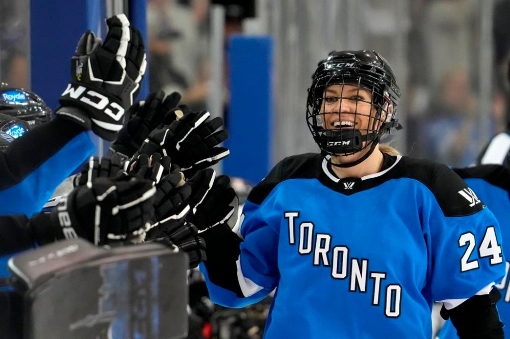 Toronto's Natalie Spooner celebrates her second goal against Ottawa with teammates on the bench during third period PWHL action in Toronto on Sunday May 5, 2024. Natalie Spooner has Nov. 30 circled on her calendar and not because the Toronto Sceptres forward feels particular animosity toward the Boston Fleet. THE CANADIAN PRESS/Frank Gunn