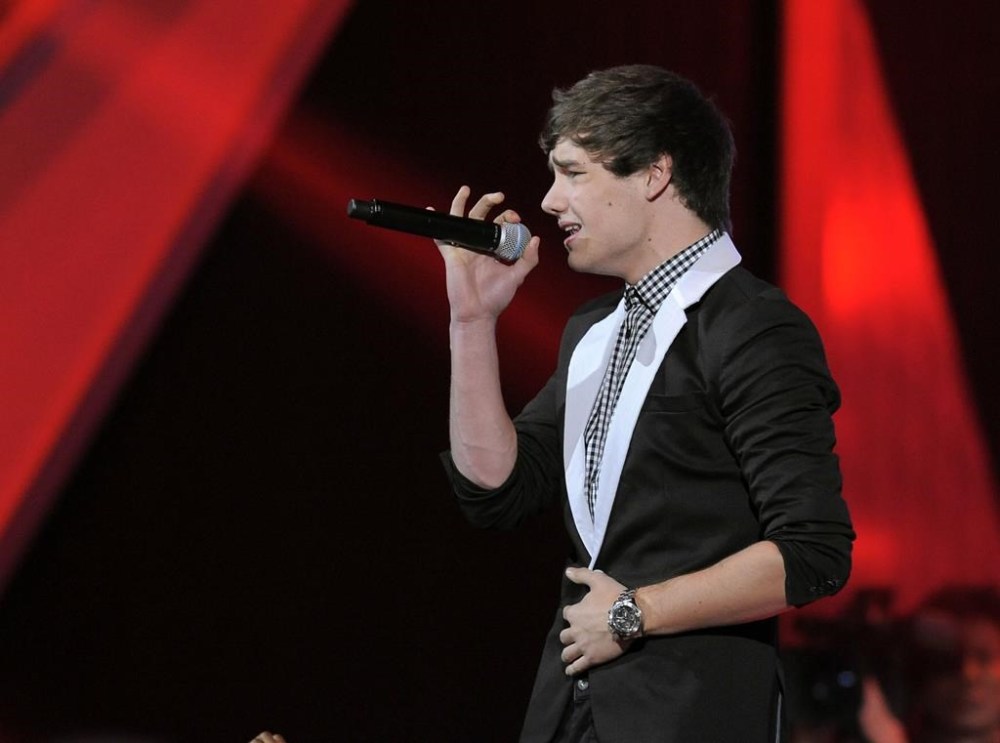 FILE - Liam Payne, of musical group One Direction, performs at Nickelodeon's 25th annual Kids' Choice Awards, March 31, 2012, in Los Angeles. (AP Photo/Chris Pizzello, File)