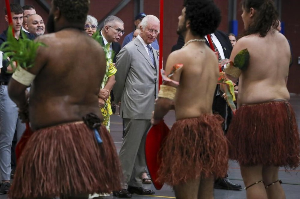 Britain's King Charles III watches a performance by the Mui Mui Bumer Gedlam group during a visit to the National Centre of Indigenous Excellence on Tuesday Oct. 22, 2024 in Sydney, Australia. (Lisa Maree Williams/Pool Photo via AP)