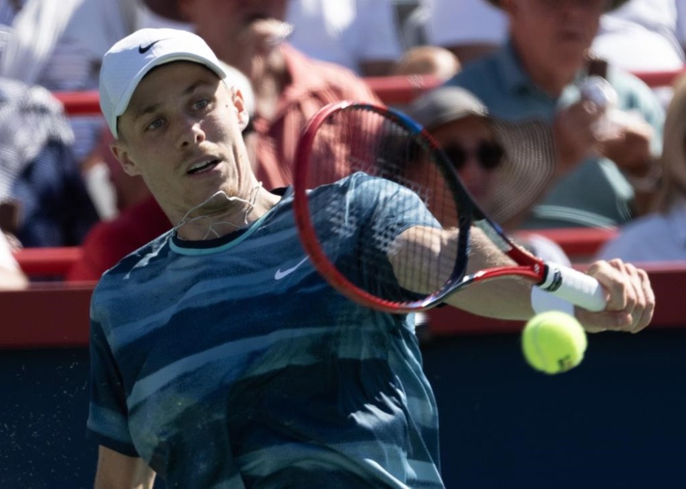 Canada's Denis Shapovalov advanced to the quarterfinals of the Swiss Indoors tennis tournament with a 6-3, 7-6 (4) win over Roberto Bautista Agut on Thursday. Shapovalov returns a shot during first-round play at the National Bank Open tennis Wednesday, August 7, 2024 in Montreal. THE CANADIAN PRESS/Ryan Remiorz