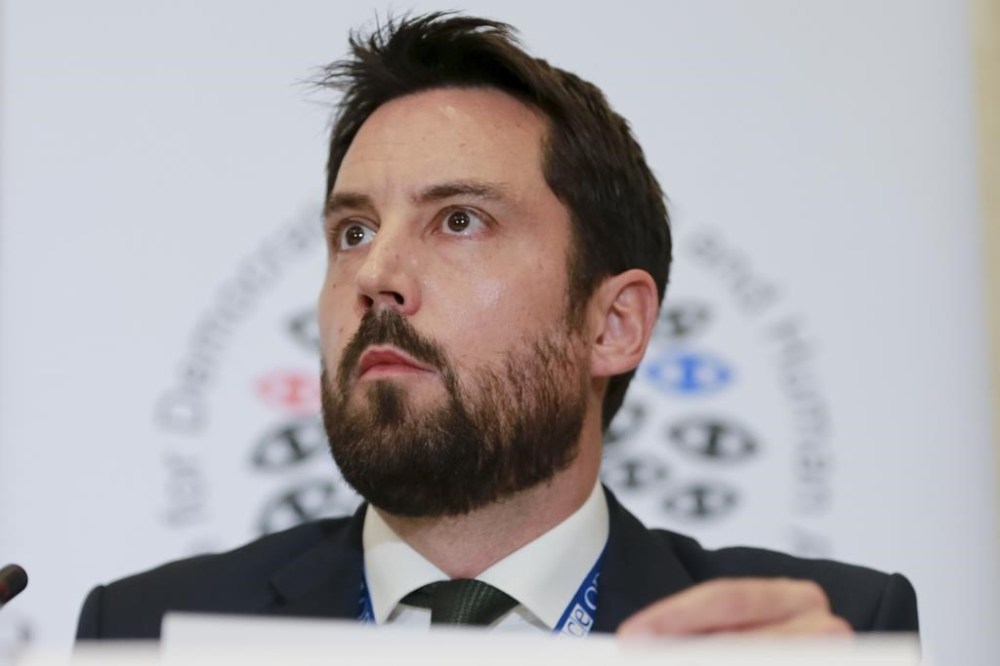 Eoghan Murphy, head of OSCE/ODIHIR observer mission, speaks to the media after the parliamentary election in Tbilisi, Georgia, Saturday, Oct. 26, 2024. (AP Photo/Zurab Tsertsvadze)