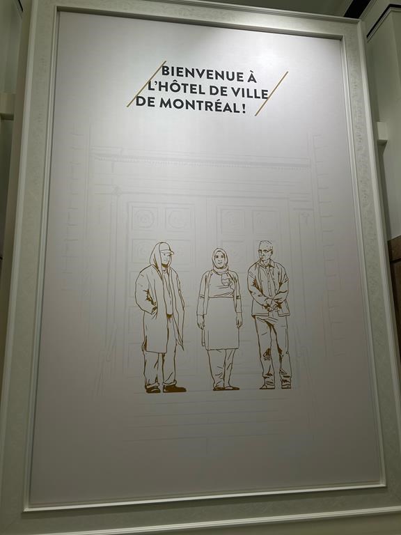 The City of Montreal has decided to remove a welcome sign at city hall with a image of a woman wearing a hijab, because it has become controversial. The sign is shown on Monday, Oct.28, 2024. THE CANADIAN PRESS/Giuseppe Valiante