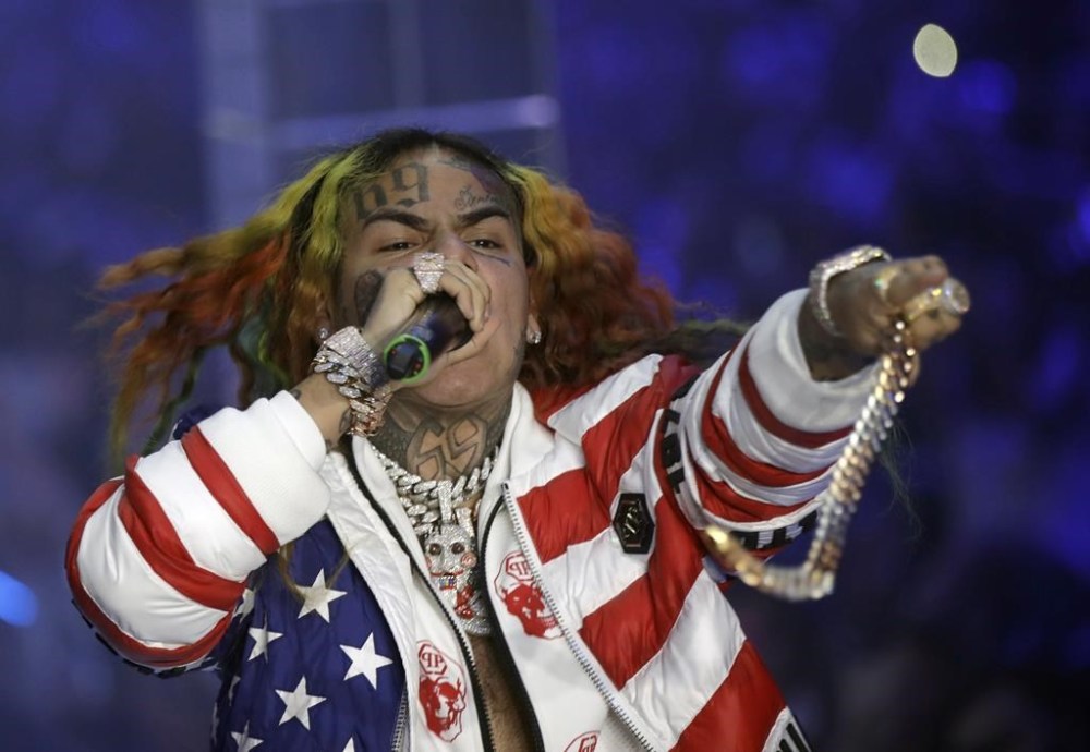 FILE - Rapper Daniel Hernandez, known as Tekashi 6ix9ine, performs during the Philipp Plein Women's 2019 Spring-Summer Collection at Fashion Week in Milan, Italy, Sept. 21, 2018. (AP Photo/Luca Bruno, File)
