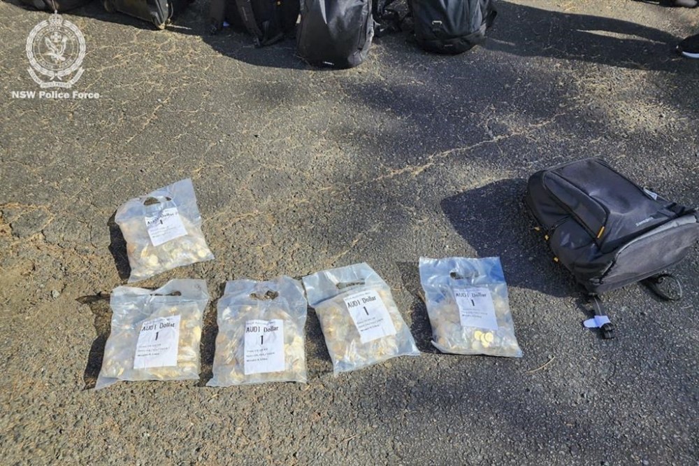 This photo released by the New South Wales Police shows some of the 40,000 stolen limited edition Bluey coins recovered from a suburb in western Sydney, Monday, Oct. 29, 2024. (New South Wales Police via AP)