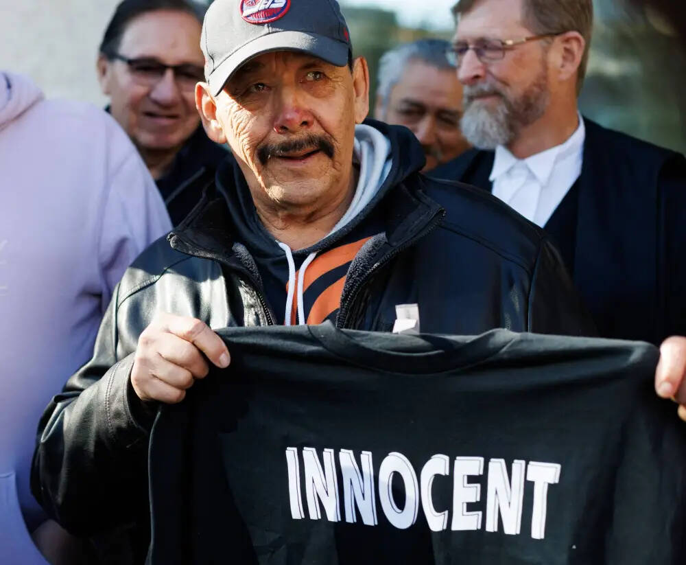 Clarence Woodhouse speaks to the media as he leaves the Winnipeg courthouse with family and his lawyers on Thursday after being acquitted. (Mike Deal/Winnipeg Free Press)