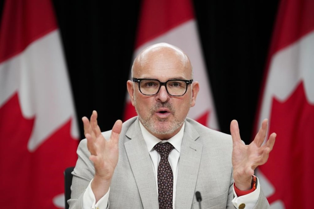 Randy Boissonnault, then the employment, workforce development and official languages minister, takes part in a press conference in Ottawa on Tuesday, Oct. 22, 2024. A Liberal MP says his colleagues are wasting committee time by launching a third investigation into the former employment minister. THE CANADIAN PRESS/Sean Kilpatrick