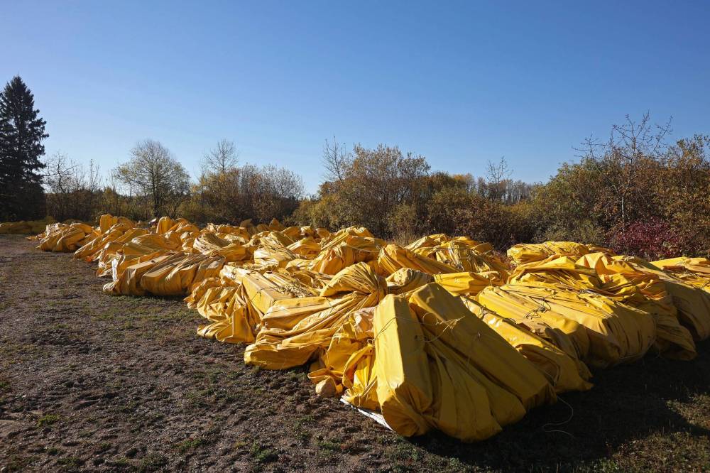 The underwater curtain that was briefly used this summer in an attempt to contain zebra mussels in Clear Lake sits near Boat Cove. The curtain has served as the subject of finger-pointing by Conservative MP Dan Mazier. (File)