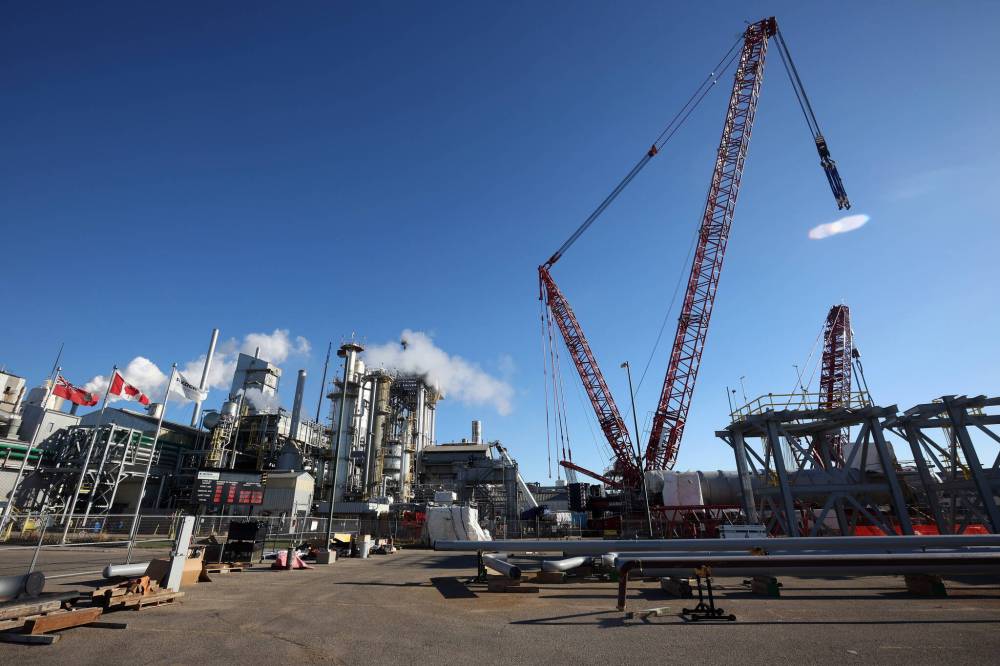 Large cranes are in place as work is done to get ready for the installation of a new 393-metric-ton converter at Koch Fertilizer’s Brandon plant on Wednesday. A portion of the converter is expected to be lifted into place by the enormous cranes today, and installation is expected to be done by sometime next week. (Photos by Tim Smith/The Brandon Sun)
