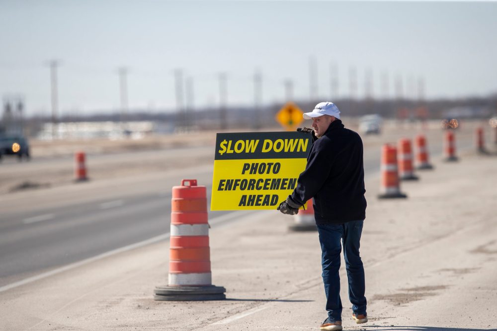 Todd Dube of Wise Up Winnipeg is shown earlier this year holding a sign alerting drivers to slow down because police are using photo radar in a construction zone in Winnipeg. We'd like to believe the citizens of Brandon will be consulted if the City of Brandon ever chooses to pursue the use of the technology here. (Winnipeg Free Press)