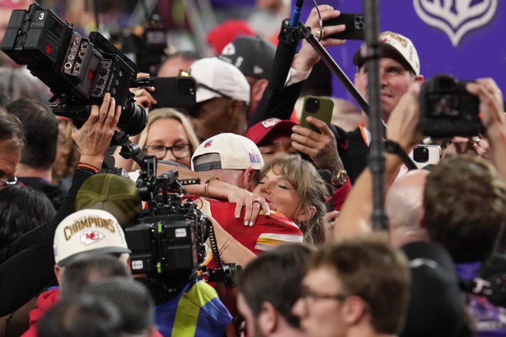 FILE - Taylor Swift embraces Kansas City Chiefs tight end Travis Kelce after the NFL Super Bowl 58 football game against the San Francisco 49ers, on Feb. 11, 2024, in Las Vegas. The Chiefs won 25-22 against the 49ers. (AP Photo/Abbie Parr, File)