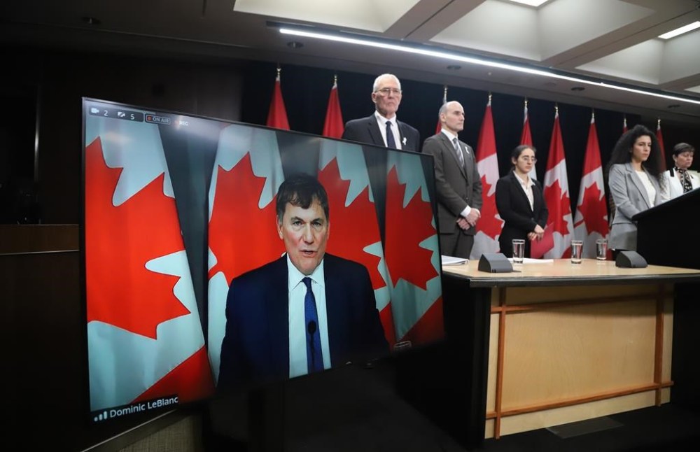 Minister of Public Safety, Democratic Institutions and Intergovernmental Affairs Dominic LeBlanc speaks virtually at a press conference on new measures to strengthen gun control in Ottawa on December 5, 2024. THE CANADIAN PRESS/Patrick Doyle
