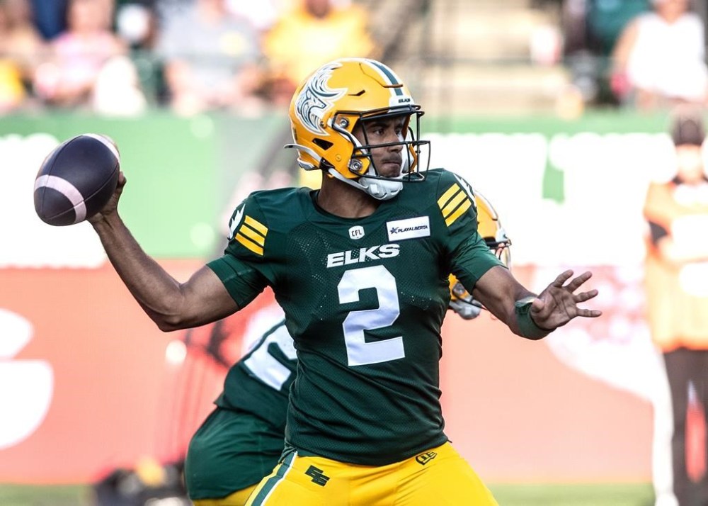 Edmonton Elks quarterback Tre Ford (2) makes the throw against the Hamilton Tiger-Cats during second half CFL action in Edmonton, Sunday, July 28, 2024. THE CANADIAN PRESS/Jason Franson