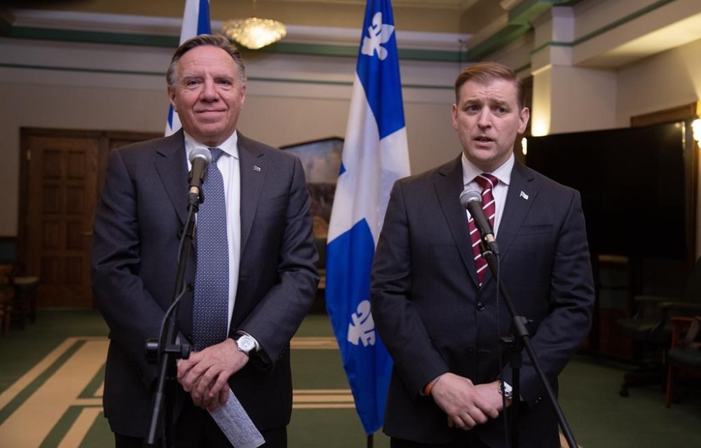 Quebec Premier Francois Legault and Newfoundland and Labrador Premier Andrew Furey hold a joint news conference outside the legislature in the Confederation Building in St. John's on Friday, Feb. 24, 2023. THE CANADIAN PRESS/Paul Daly