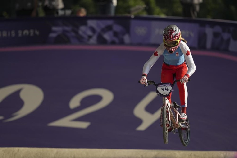 Molly Simpson of Canada practises before a BMX racing event, at the 2024 Summer Olympics, Friday, Aug. 2, 2024, in Saint-Quentin-en-Yvelines, France. Simpson is still riding the high of a fifth-place finish at the Paris Olympics. But the 22-year-old from Red Deer, Alta., has plenty more to do. THE CANADIAN PRESS/AP/Thibault Camus