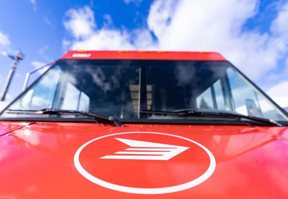 A Canada Post mail truck is seen parked in their distribution centre in Montreal, Wednesday, Nov. 27, 2024. THE CANADIAN PRESS/Christinne Muschi