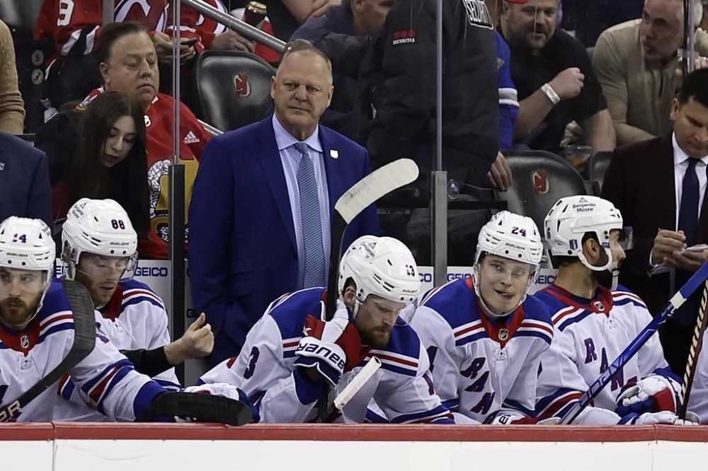 Hockey Canada has named Gerard Gallant head coach of Canada’s team for the 2024 Spengler Cup, set for Dec. 26-31 in Davos, Switzerland. New York Rangers head coach Gallant, center top, looks on during the first period of Game 7 against the New Jersey Devils in an NHL hockey Stanley Cup first-round playoff series Monday, May 1, 2023, in Newark, N.J. THE CANADIAN PRESS/AP-Adam Hunger