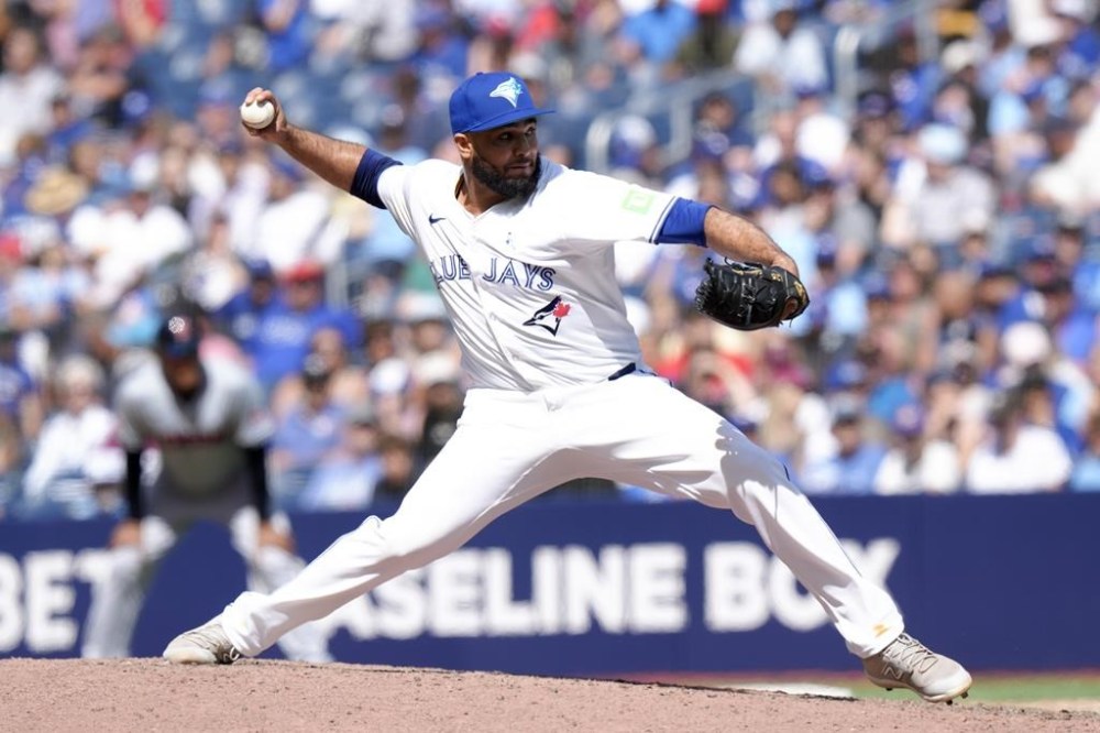Toronto Blue Jays relief pitcher Yimi Garcia works against the Cleveland Guardians during ninth inning American League MLB baseball action in Toronto on June 16, 2024. THE CANADIAN PRESS/Chris Young