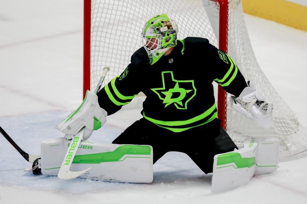 Dallas Stars goaltender Jake Oettinger (29) blocks the net during the third period of an NHL hockey game against the Washington Capitals in Dallas, Monday, Dec. 16, 2024. (AP Photo/Gareth Patterson)