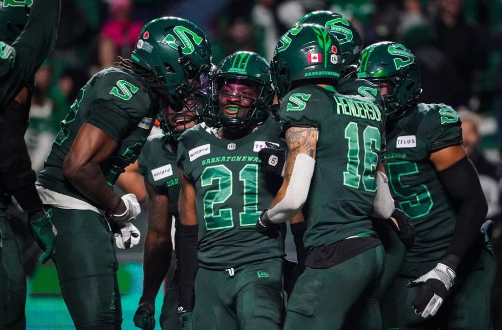 The Saskatchewan Roughriders received the top grades in the CFL Players' Association's first-ever team report cards. Roughriders players celebrate after defensive back Nelson Lokombo's (21) interception against the B.C. Lions during CFL Western Conference semifinal football action in Regina, on Saturday, November 2, 2024. THE CANADIAN PRESS/Heywood Yu