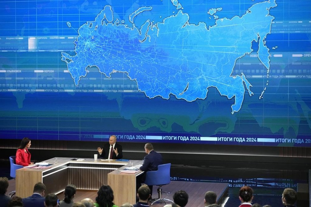 Russian President Vladimir Putin speaks during his annual news conference and call-in show at Gostinny Dvor in Moscow, Russia, Thursday, Dec. 19, 2024. (AP Photo/Alexander Zemlianichenko)