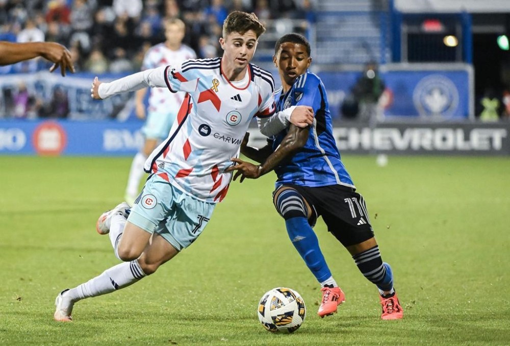 CF Montreal's Jahkeele Marshall-Rutty, right, challenges Chicago Fire's Brian Gutierrez during MLS soccer action in Montreal, Saturday, September 21, 2024. THE CANADIAN PRESS/Graham Hughes