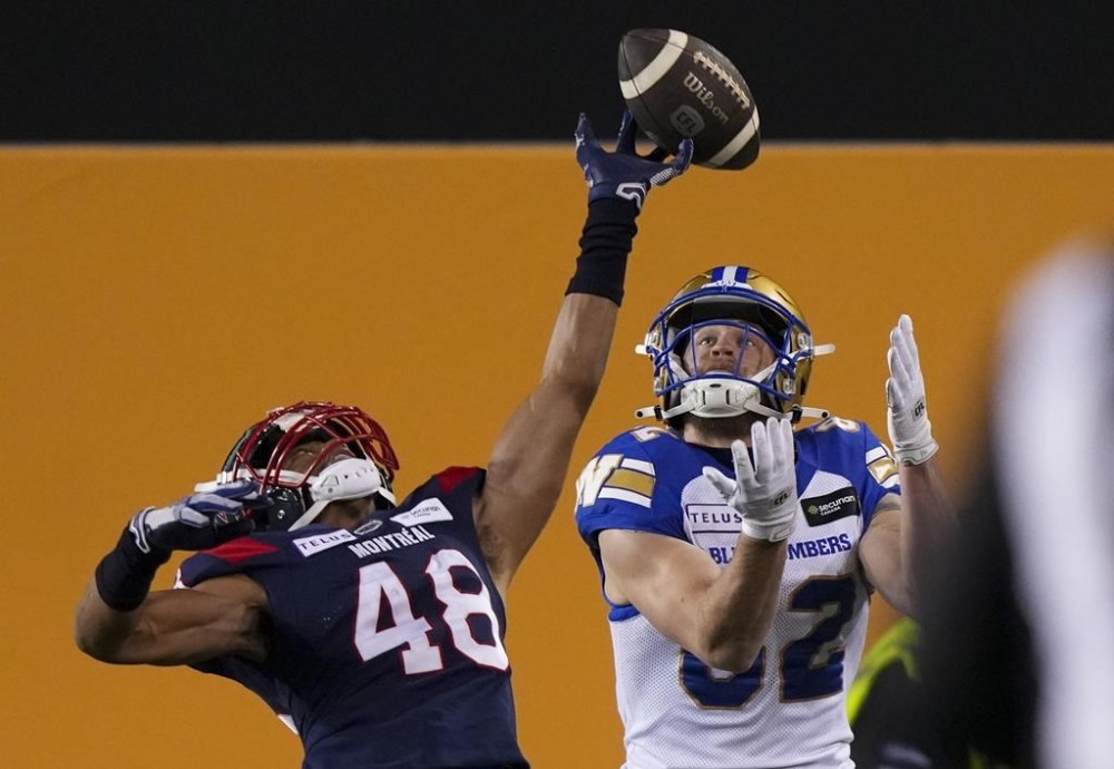 Montreal Alouettes defensive back Kabion Ento (48) knocks down a pass intended for Winnipeg Blue Bombers wide receiver Drew Wolitarsky (82) during the first half of football action at the 110th CFL Grey Cup in Hamilton, Ont., on Sunday, Nov. 19, 2023. The Montreal Alouettes signed American defensive back Ento to a two-year contract on Thursday, keeping him with the team through 2026.THE CANADIAN PRESS/Nathan Denette
