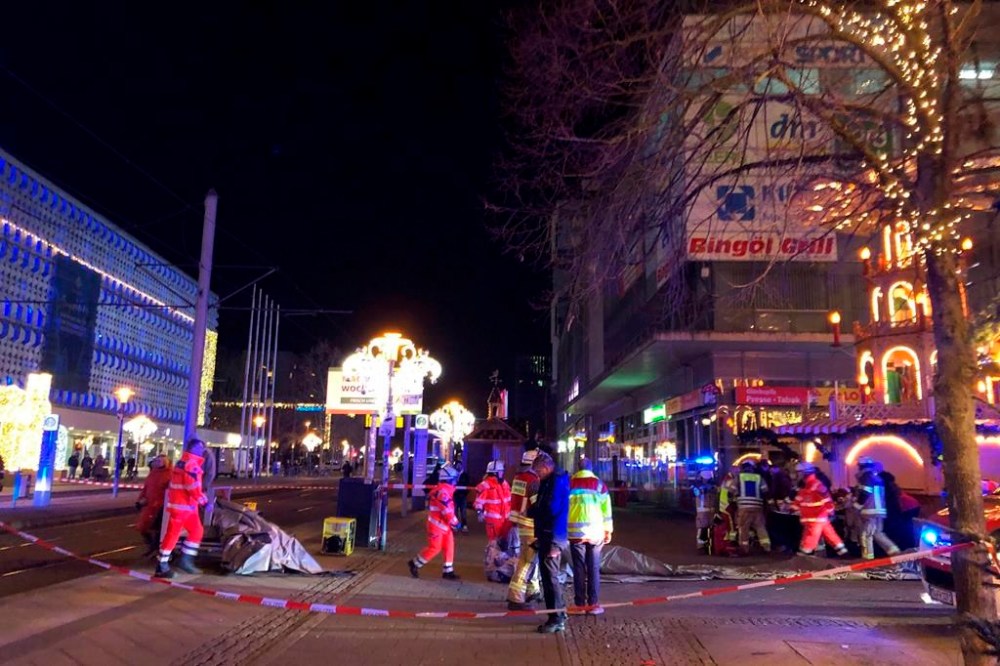 Emergency services attend an incident at the Christmas market in Magdeburg, Germany, Friday Dec. 20, 2024. (Dörthe Hein/dpa via AP)
