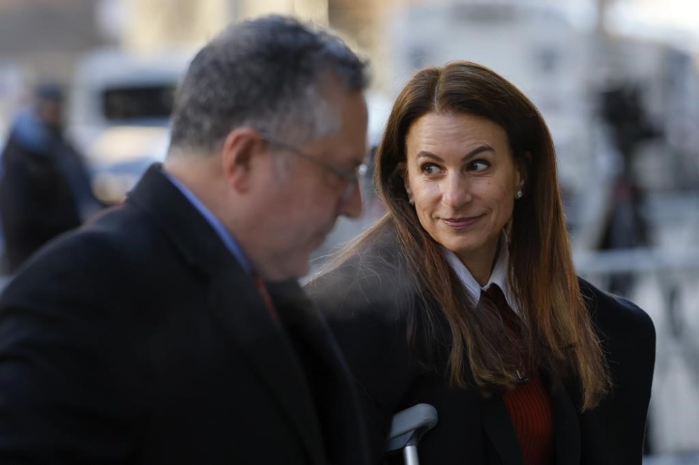 Karen Friedman Agnifilo, right, attorney for Luigi Mangione, arrives at Manhattan Criminal Court, Monday, Dec. 23, 2024, in New York. (AP Photo/Stefan Jeremiah)