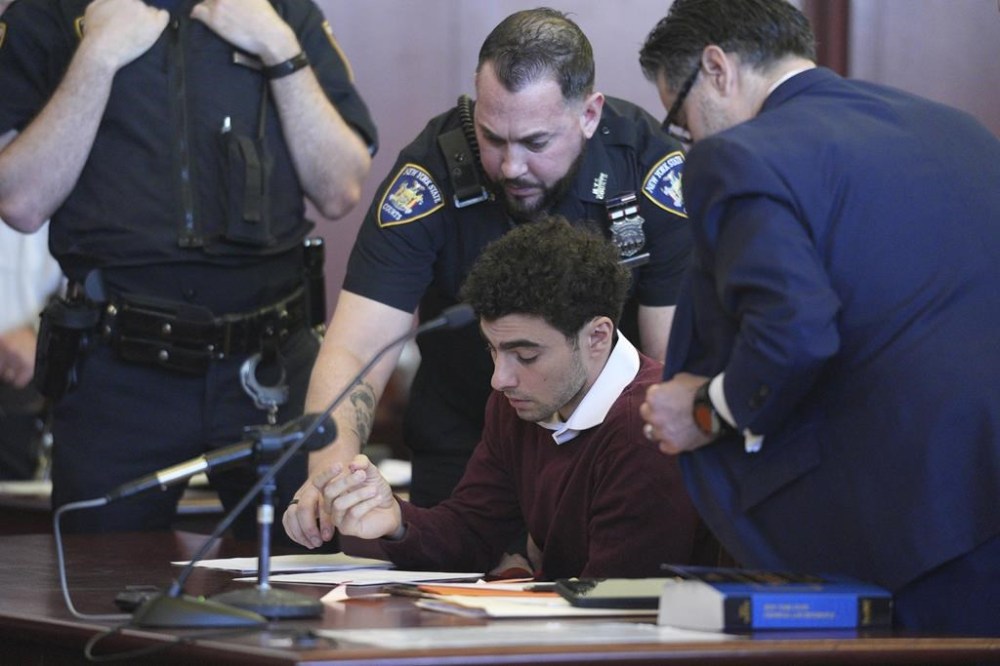 Luigi Mangione appears in Manhattan Criminal court for his arraignment on state murder and terror charges in the killing of UnitedHealthcare CEO Brian Thompson, Monday, Dec. 23, 2024, in New York. (Curtis Means/Pool Photo via AP)