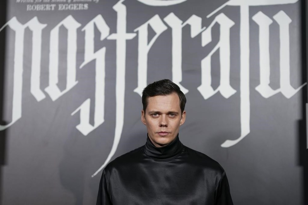 Bill Skarsgard arrives at the premiere of