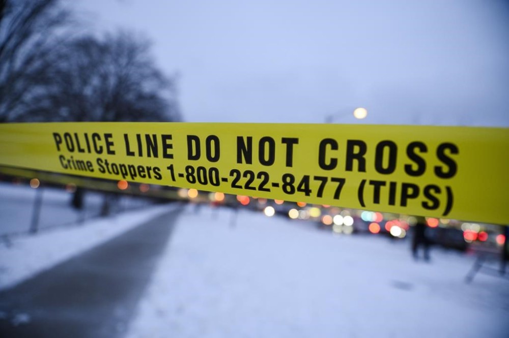 Police tape is seen in Toronto, Monday, Jan. 22, 2024. THE CANADIAN PRESS/Christopher Katsarov