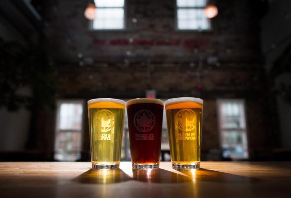 Pints of beer are seen on the bar at a brewer in Vancouver, B.C., Monday, March 20, 2017. THE CANADIAN PRESS/Darryl Dyck