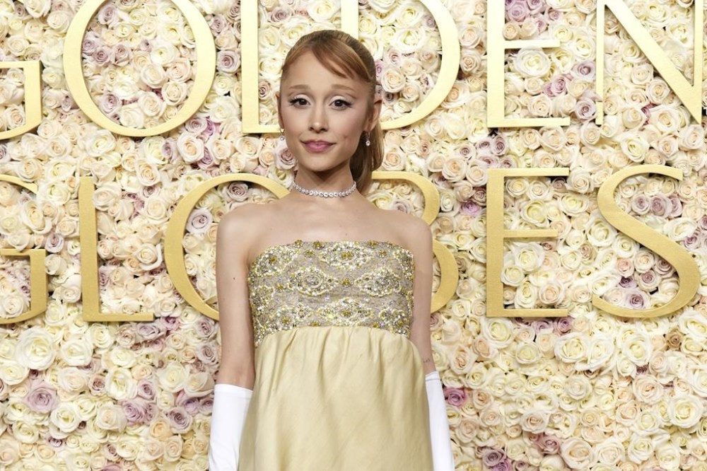 Ariana Grande arrives at the 82nd Golden Globes on Sunday, Jan. 5, 2025, at the Beverly Hilton in Beverly Hills, Calif. (Photo by Jordan Strauss/Invision/AP)