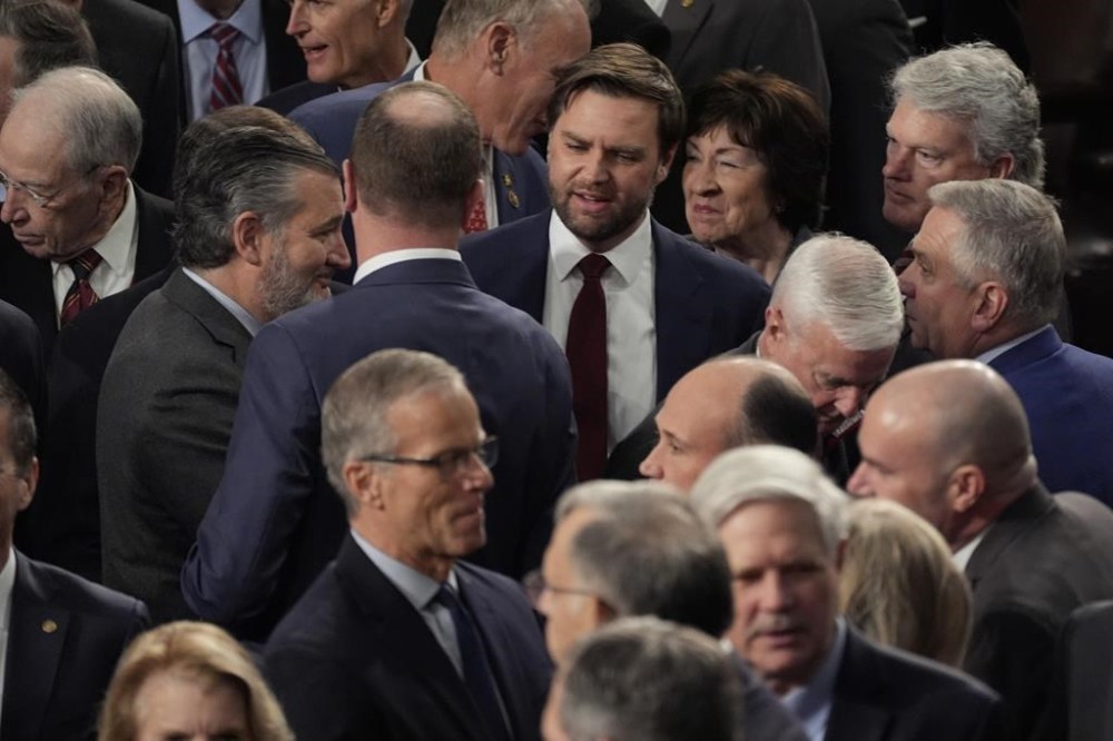 Republicans congratulate Vice President-elect JD Vance after a joint session of Congress convened to confirm the Electoral College votes, affirming President-elect Donald Trump's victory in the presidential election, Monday, Jan. 6, 2025, at the U.S. Capitol in Washington. (AP Photo/Manuel Balce Ceneta)