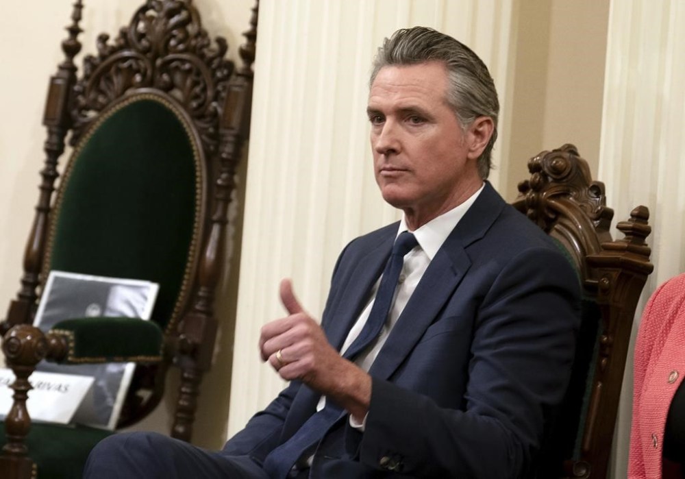 FILE - California Gov. Gavin Newsom gives a