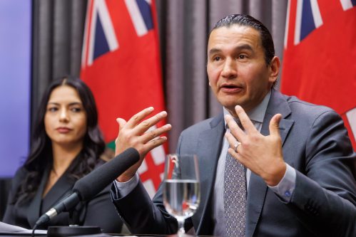 Premier Wab Kinew (right) and Amna Mackin, the assistant deputy minister leading the landfill search operation, speak during a press conference after returning from observing the start of the first day workers began sifting through the material excavated from a targeted area of the Prairie Green Landfill in the search for the remains of two First Nations women — Morgan Harris, 39, and Marcedes Myran, 26 — who were slain by serial killer Jeremy Skibicki. (Mike Deal/Winnipeg Free Press)
