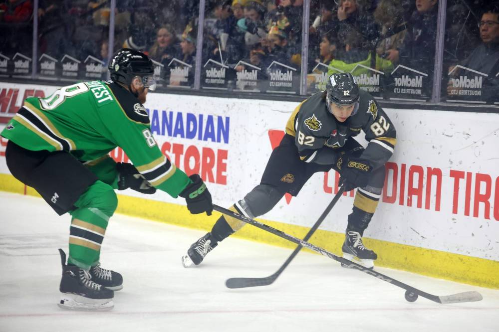 Brandon Wheat Kings forward Dominik Petr (82) competes for the puck against Prince Albert Raiders defenceman Vojtech Vochvest (8) during Saturday's Western Hockey League game at Westoba Place in a battle of Czech players. Petr is trying out for a spot on his national team at the upcoming world junior championship. (Tim Smith/The Brandon Sun)