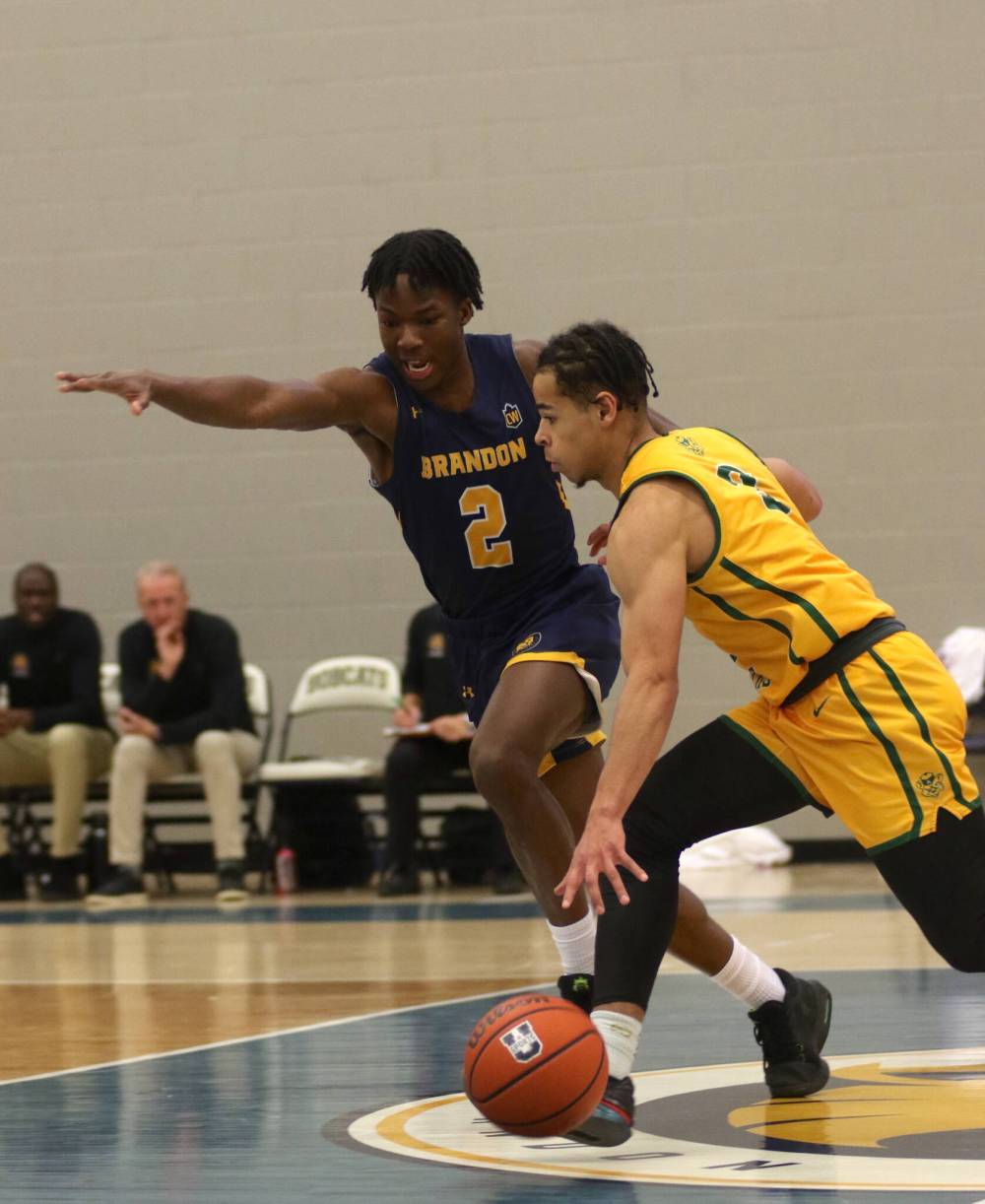 Youri Cange (2) had his breakout weekend against Alberta when he shut down star guard Isaac Simon to help the Bobcats to a 78-59 victory on Nov. 23. (Thomas Friesen/The Brandon Sun)